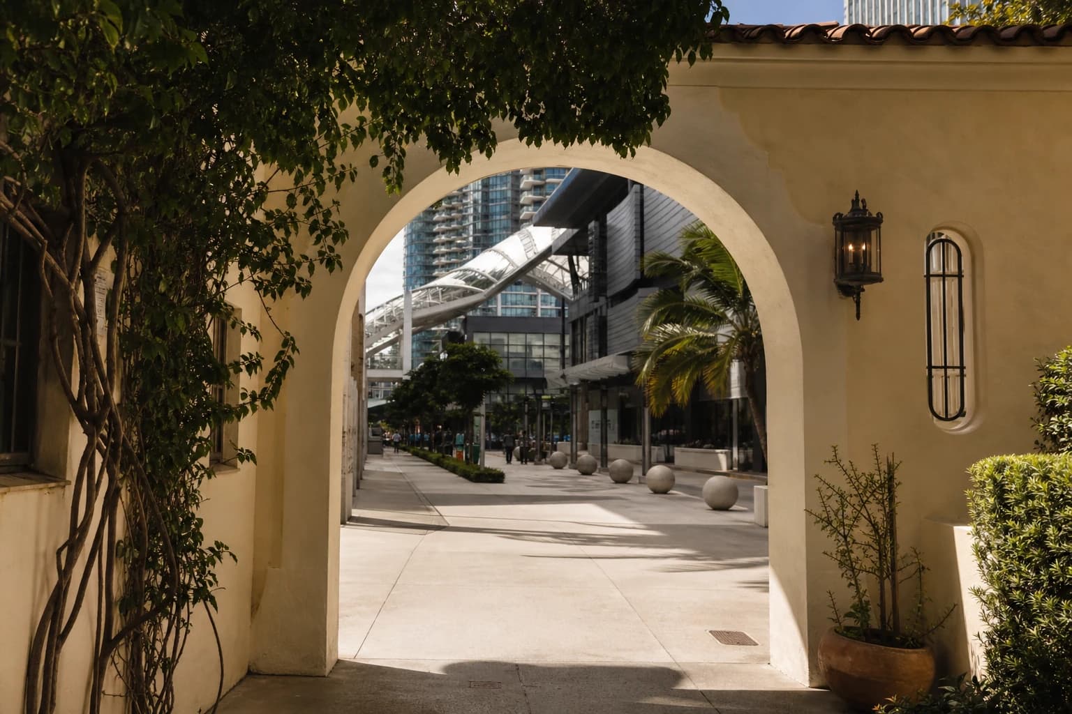 Walking distance — Brickell City Centre archway visible from sidewalk at mid-day